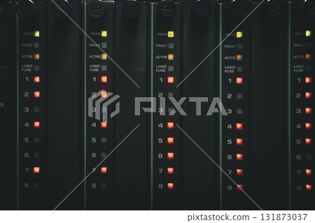 Row of led lamps with a green light on the top left Row of led lamps with a green light on the top left 131873037