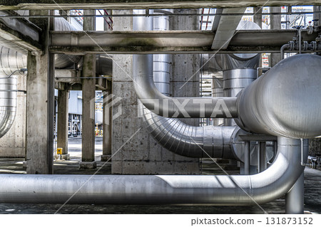 Large pipe with a lot of metal on it 131873152