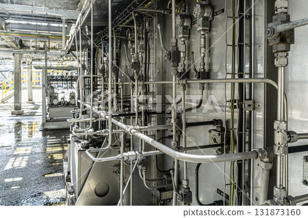 Large industrial building with pipes and wires 131873160