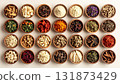 A neatly arranged flat lay of dried adaptogenic roots and herbs such as ashwagandha and rhodiola, displayed in small wooden bowls on a neutral background, symbolizing natural wellness and balance 131873429