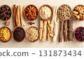 A neatly arranged flat lay of dried adaptogenic roots and herbs such as ashwagandha and rhodiola, displayed in small wooden bowls on a neutral background, symbolizing natural wellness and balance 131873434