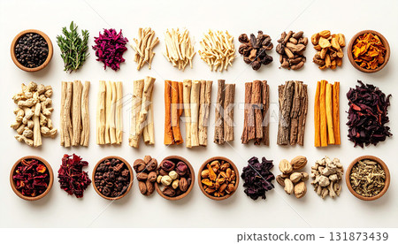 A neatly arranged flat lay of dried adaptogenic roots and herbs such as ashwagandha and rhodiola, displayed in small wooden bowls on a neutral background, symbolizing natural wellness and balance 131873439
