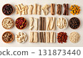 A neatly arranged flat lay of dried adaptogenic roots and herbs such as ashwagandha and rhodiola, displayed in small wooden bowls on a neutral background, symbolizing natural wellness and balance 131873440