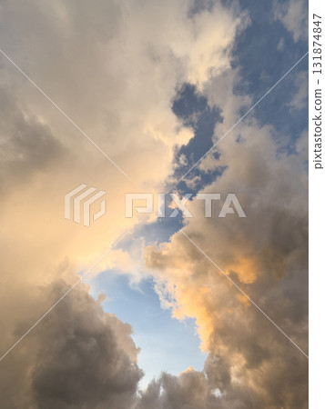 Fluffy clouds orange frame 131874847
