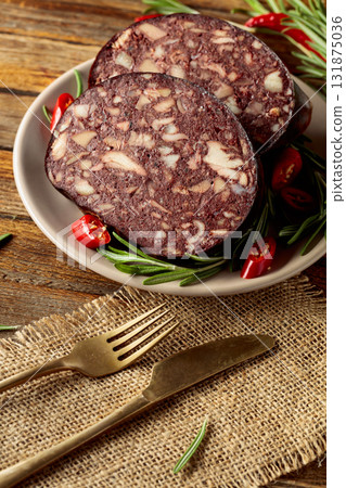 Black pudding or blood sausage with rosemary and red pepper. 131875036
