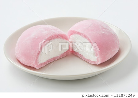 Delicious Japanese moti desserts. Close up. Asian rice daifuku dessert sweet mochi. Cut in half with filling. Traditional dessert mochi ice cream. Colorful rice cake. Fukashi manju. Culinary delights Delicious Japanese moti desserts. Close up. Asian rice daifuku dessert sweet mochi. Cut in half with filling. Traditional dessert mochi ice cream. Colorful rice cake. Fukashi manju. Culinary delights 131875249