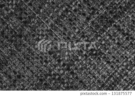 Closeup, macro texture of black woven burlap fabric with thick threads and rough textile pattern Closeup, macro texture of black woven burlap fabric with thick threads and rough textile pattern 131875577