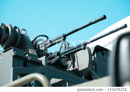 Gun muzzle on a military vehicle 131876252