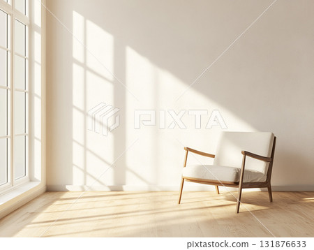 An empty, sunlit room with a modern wooden armchair, featuring strong geometric shadows. 131876633