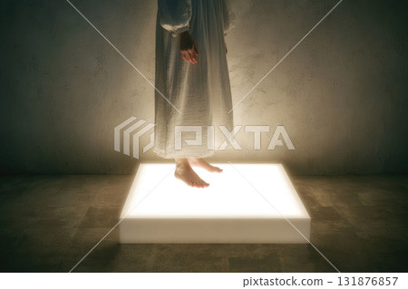 Woman in white dress standing barefoot on illuminated platform, modern minimalist studio, soft lighting, cropped view, serene mood, textured wall background, contemporary art concept 131876857