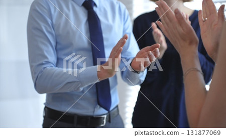 Business people hands clapping, showing applause and appreciation for success and achievement during a corporate event or conference meeting in bright office Business people hands clapping, showing applause and appreciation for success and achievement during a corporate event or conference meeting in bright office 131877069