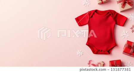 Red Baby onesie on pale pink Winter Holiday Festive Background. Fashion newborn clothes. Flat lay top view. Baby kids soft organic cotton clothing. Infant trendy bodysuit product promo. Gender neutral 131877381