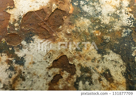 Close-up of rust and decay on a weathered metal surface 131877709