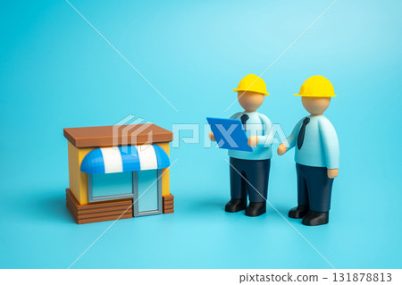 Builders built a store. Business construction. Expanding a retail outlet. Opening a business. Commercial real estate, entrepreneurship, retail growth, and small business development. 131878813