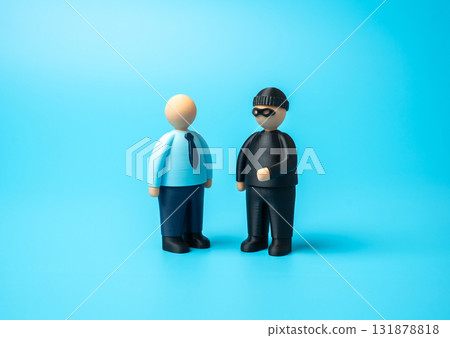 The swindler wants to deceive the office worker. Fraud, deception, and financial scams. Cybersecurity, financial fraud, corporate responsibility. Manipulation, vulnerability, and workplace corruption. The swindler wants to deceive the office worker. Fraud, deception, and financial scams. Cybersecurity, financial fraud, corporate responsibility. Manipulation, vulnerability, and workplace corruption. 131878818