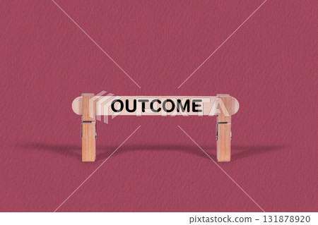 Outcome symbol. Single Wooden stick pinned by Clothespins, beautiful Pink Background. Business and Outcome concept with copy space 131878920