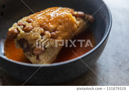 Teochew Zongzi with traditional sweet and spicy sauce Teochew Zongzi with traditional sweet and spicy sauce 131879328