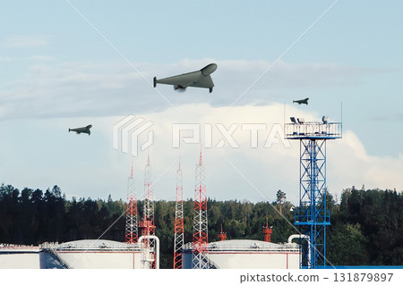Drones attack the territory of an oil depot. Drones attack the territory of an oil depot. 131879897