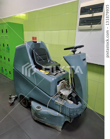 Self-propelled floor scrubber with operator seat. Ride-on floor scrubber machine 131879935