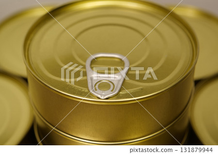 Yellow metal closed tin cans 131879944