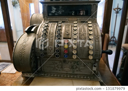 Old mechanical cash register in pharmacy. Antique cash register 131879979