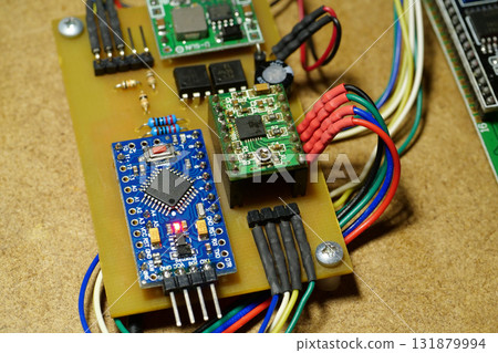 Microcircuit with electronic components connected to power supply. Electronics Microcircuit with electronic components connected to power supply. Electronics 131879994
