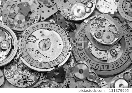Old mechanical watches with gears and cogs. Watch or clock mechanisms Old mechanical watches with gears and cogs. Watch or clock mechanisms 131879995