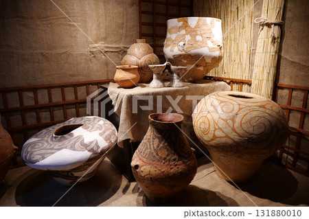 Real ancient pottery glued together from separate fragments Real ancient pottery glued together from separate fragments 131880010