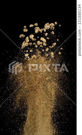 Freeze Motion Shot of Flying Soil , Isolated on Black Background Freeze Motion Shot of Flying Soil , Isolated on Black Background 131880134