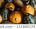 Yellow and Green Mini Decorative Pumpkins 131880139