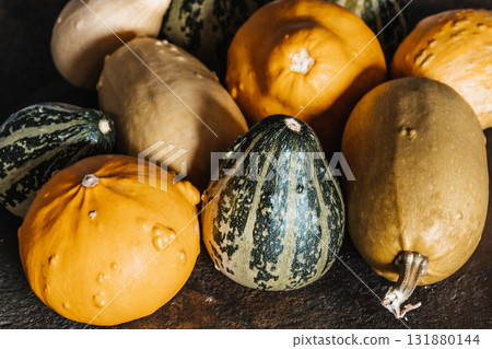 Yellow and Green Mini Decorative Pumpkins Yellow and Green Mini Decorative Pumpkins 131880144