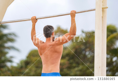 Muscular biceps and triceps. Strong athlete. Man pullup. Muscular man sportsman with strong back muscle. Sport pullup workout. Sport training. Man sportsman do pulling exercise 131880165