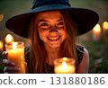 A girl dressed in dark clothing sitting calmly near glowing candles, her gaze fixed on the flickering light, creating an enchanting and mystical atmosphere 131880186