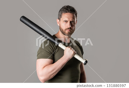 adult criminal man with bat isolated on grey background. criminal man with bat in studio. 131880397