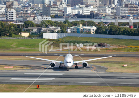 Passenger plane waiting on the runway | Bird's-eye view 131880489