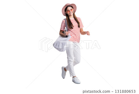 smiling teen girl in summer tote isolated on white. teen girl in summer tote at studio. smiling teen girl in summer tote isolated on white. teen girl in summer tote at studio. 131880653