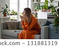 Middle-aged woman with serious, thoughtful expression deeply reflecting on received information 131881319