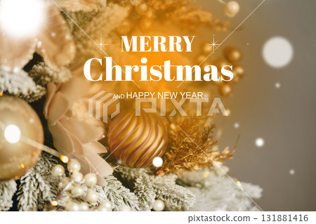 Merry Christmas decorations with golden ornaments and festive lights during holiday season Merry Christmas decorations with golden ornaments and festive lights during holiday season 131881416