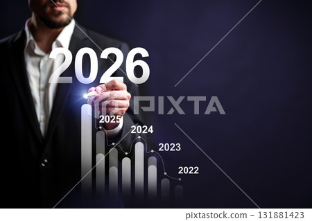 Business professional demonstrates growth trends with graph from 2022 to 2026 Business professional demonstrates growth trends with graph from 2022 to 2026 131881423