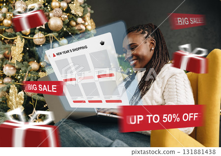 Festive woman celebrating big sale while decorating Christmas tree indoors 131881438