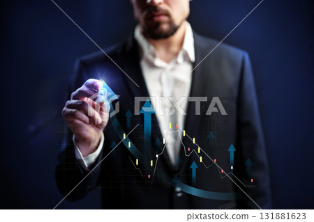 Business professional analyzing financial data with digital graphs at night Business professional analyzing financial data with digital graphs at night 131881623