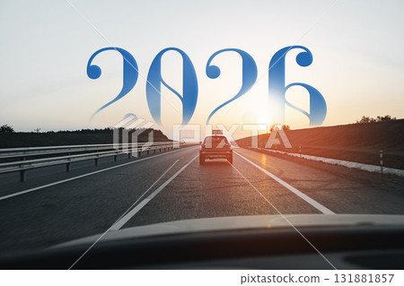 Road trip at sunset with the year 2026 reflected in the sky 131881857