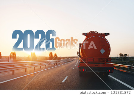 Driving towards goals in 2026 on an open highway during sunset 131881872