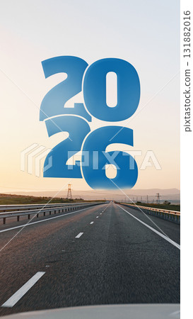 Road stretches towards horizon with bold 2026 overlay at sunset 131882016