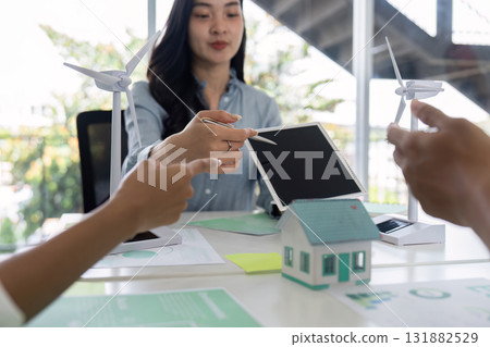 Sustainability Planning and Strategy. Discussing renewable energy solutions with a focus on ESG. 131882529