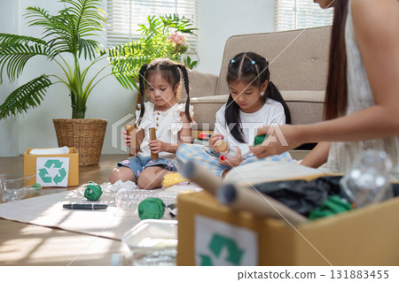 Recycling and Play. Kids crafting with recyclable materials, learning through hands-on activities. 131883455