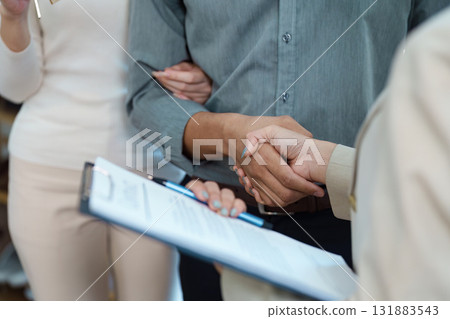 Real estate handshake. Client and agent completing the deal with a handshake. Real estate handshake. Client and agent completing the deal with a handshake. 131883543