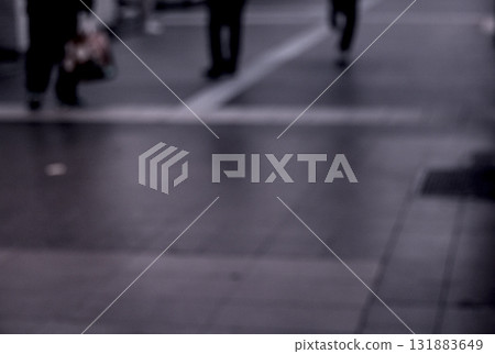 blurred image of people walking on the street 131883649