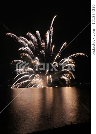 Fireworks over the lake coloring the night sky - Scenes from the Kashima City Fireworks Festival 131884356