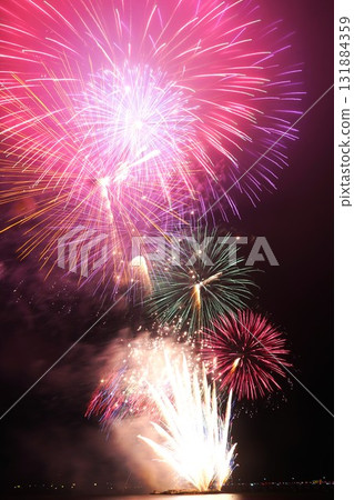 Fireworks over the lake coloring the night sky - Scenes from the Kashima City Fireworks Festival 131884359